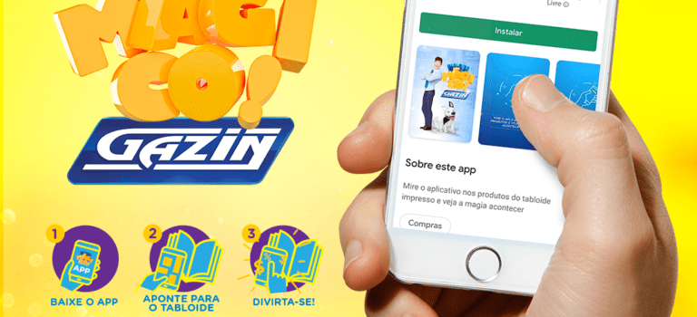 Arte autoral Gazin, mostrando um celular na mão de uma pessoa e na tela do aparelho o aplicativo do Tabloide Mágico Gazin, que trabalha com realidade aumenta.